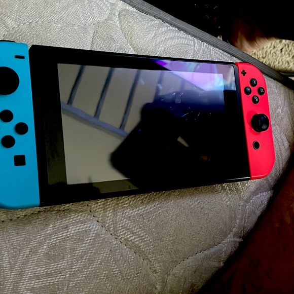 nintendo switch colors are blue, black, and red new but has been used - Picture 1 of 1